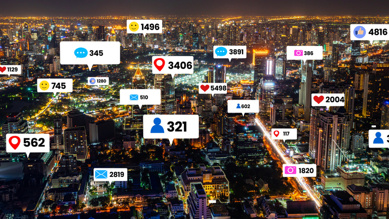 Social media icons fly over city downtown showing people engagement connection